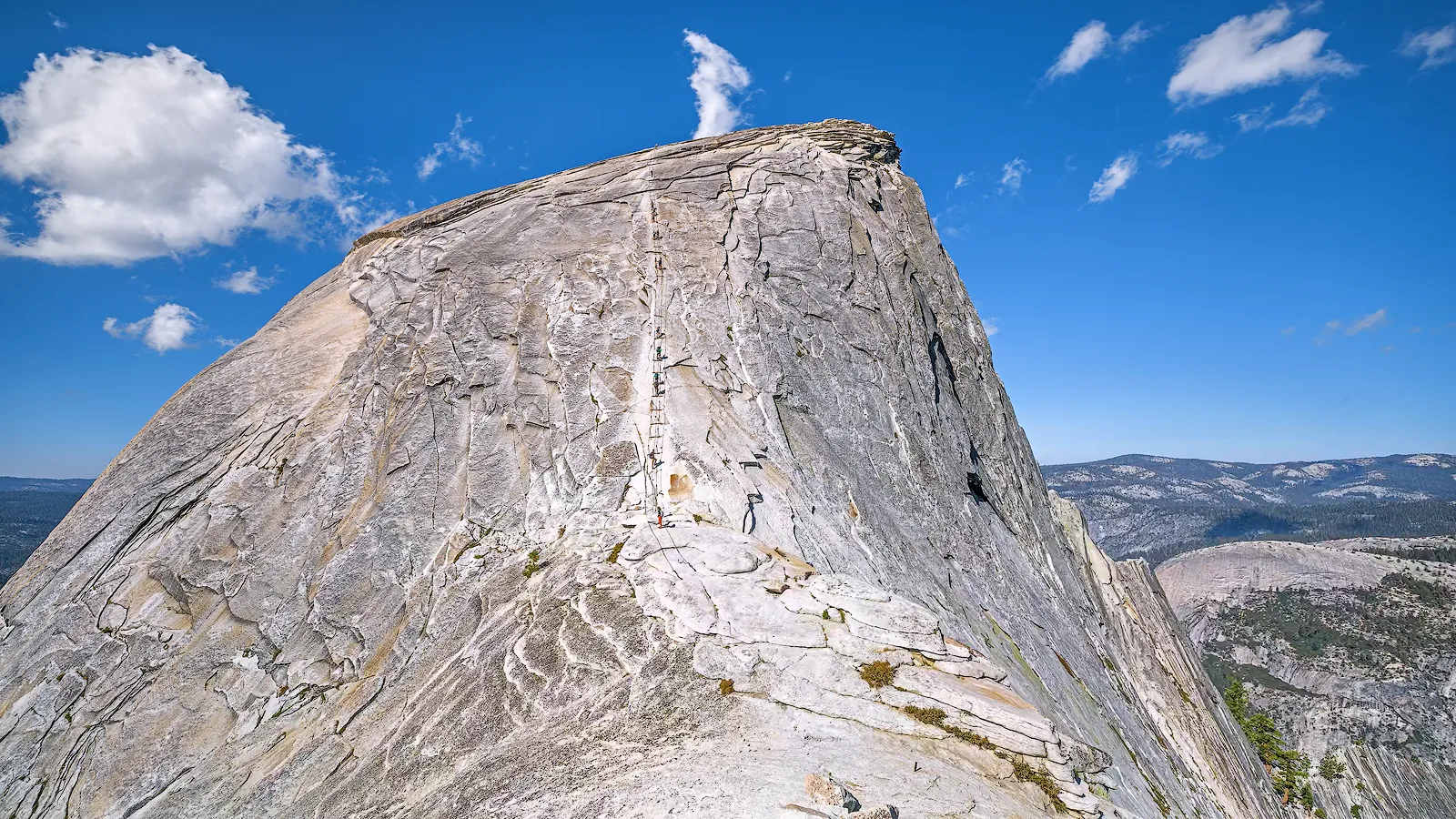 Timelapse of hikers climbing the steel cable ladder of Half-Dome in Yosemite