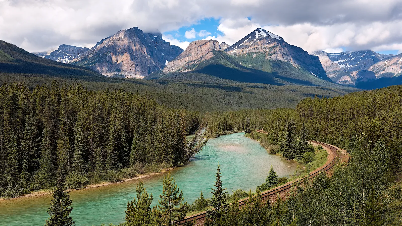 Timelapse of freight train passing Morants Curve in Banff National Park
